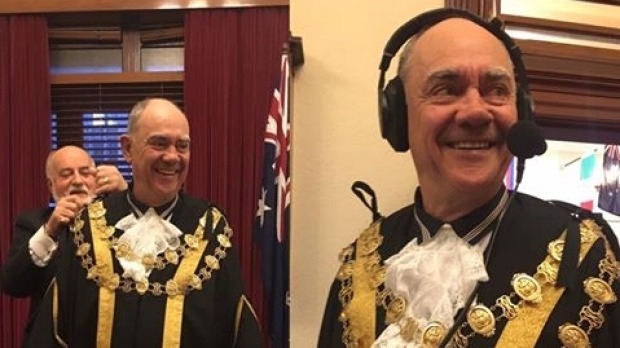 3AW's John Burns tries on the mayoral robes on Melbourne Day